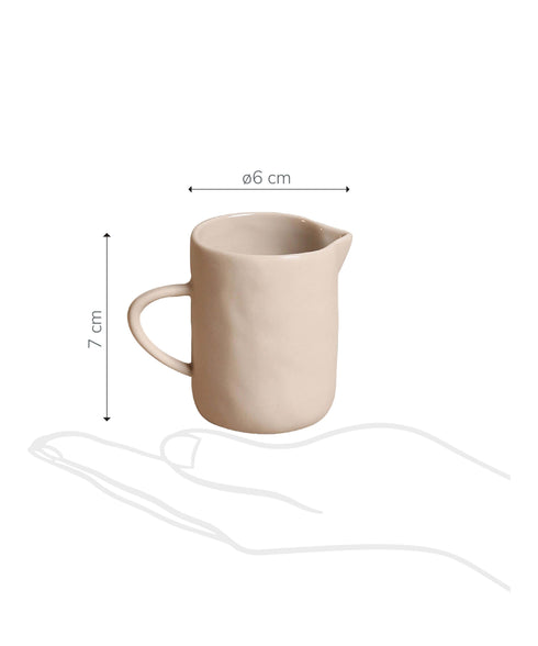 https://www.tinkalu.com/media/da/a4/75/1732480312/Hand Milch beige tiny.jpg