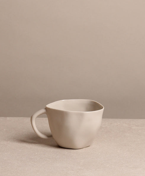 https://www.tinkalu.com/media/97/4e/36/1730562128/Tasse mittel beige.jpg
